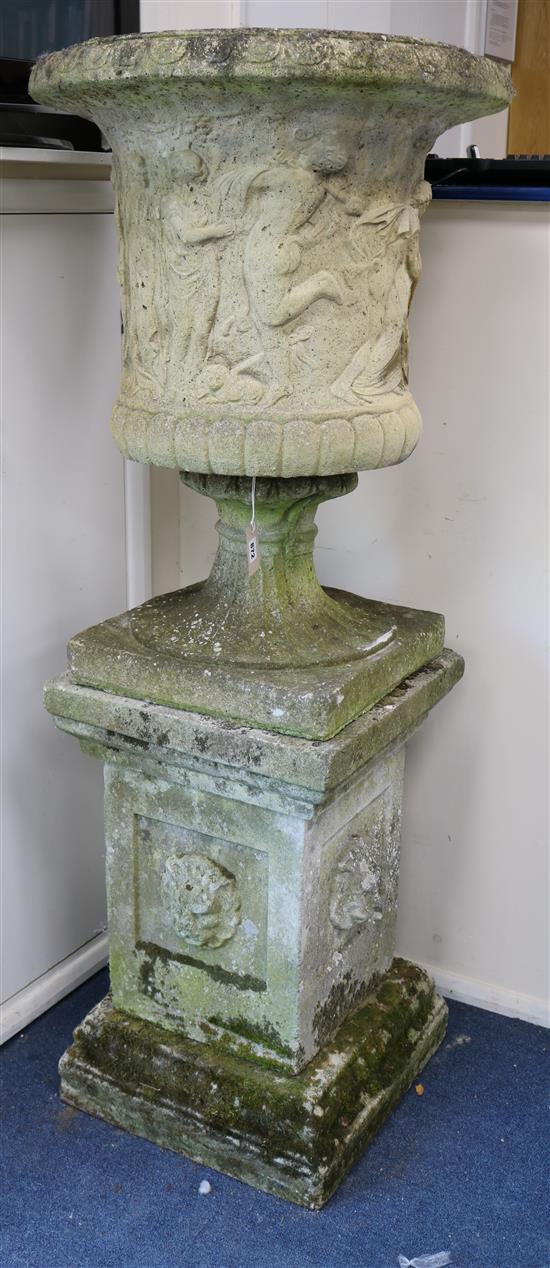 Pair of garden urns on pedestal bases W.65cm